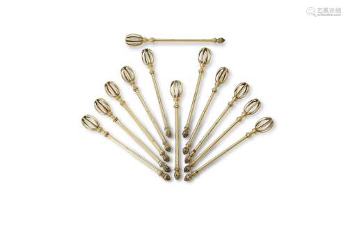 A set of twelve French silver gilt cocktail stirrers by Robert Linzeler & Cie.