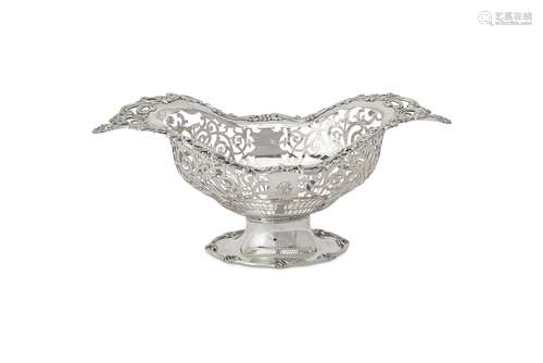 A large silver shaped oval pedestal basket by Edward Barnard & Sons