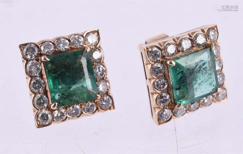 A pair of emerald and diamond cluster earrings