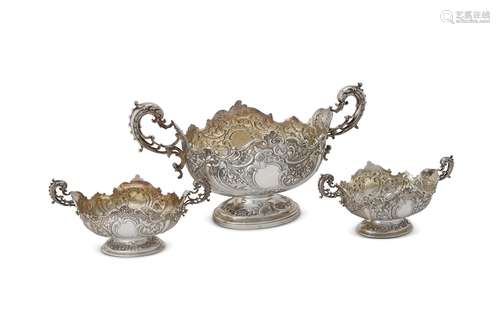 A suite of three late Victorian silver twin handled oval baskets by Walter & John Barnard