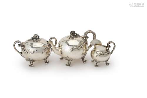 Y A heavy gauge French silver naturalistic three piece tea service in Dutch taste by Henri Chevron
