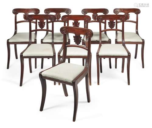 A set of eight George IV mahogany dining chairs