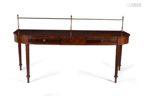 A mahogany bowfront serving table