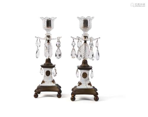 A pair of George III cut glass, ormolu and gilt porcelain mounted candlesticks