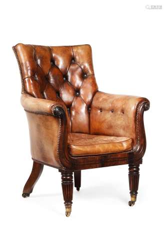A George IV mahogany and leather upholstered armchair