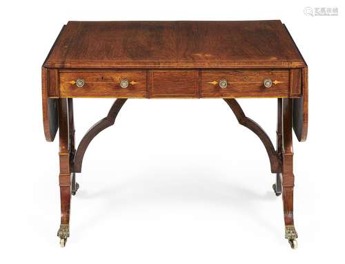 Y A Regency rosewood, inlaid and brass mounted sofa table