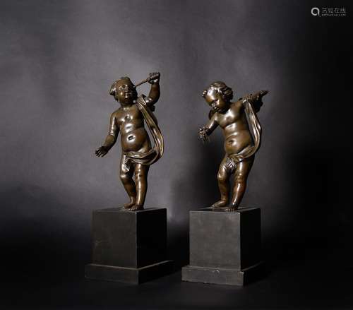 A pair of French patinated bronze models of putti emblematic of Astronomy