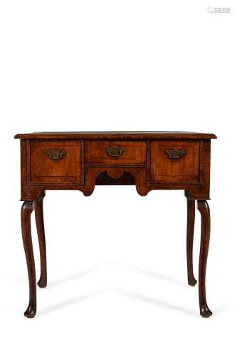 A George I walnut and featherbanded side table