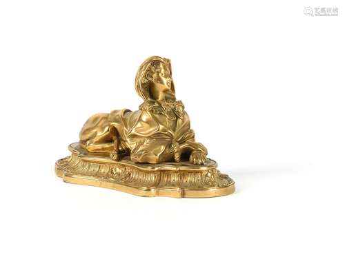 A fine French gilt bronze figural presse-papier in Louis XV style