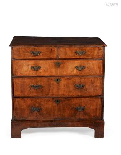 A George II walnut and crossbanded chest of drawers