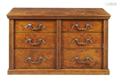 A George IV burr oak and gilt metal mounted chest of drawers