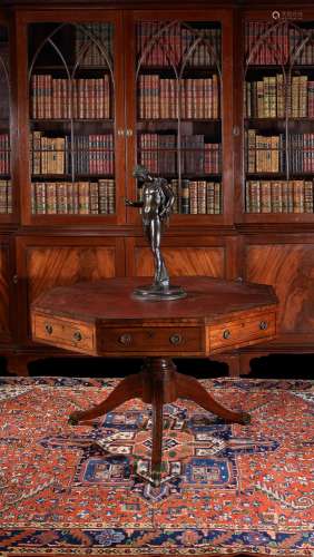 A Regency octagonal library drum table
