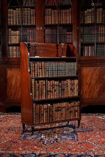 A Regency mahogany and ebony 'waterfall' bookcase