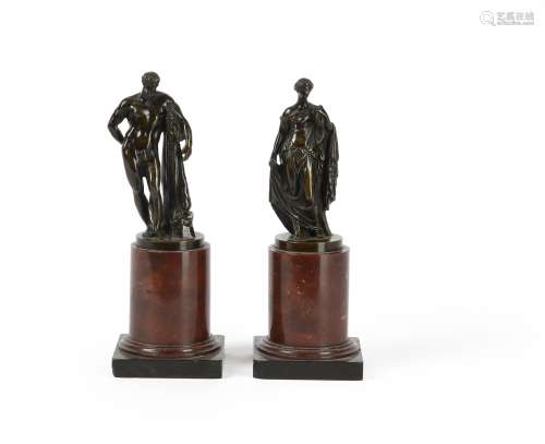 A pair of Italian patinated bronze Grand Tour souvenir models of Hercules and Flora Farnese