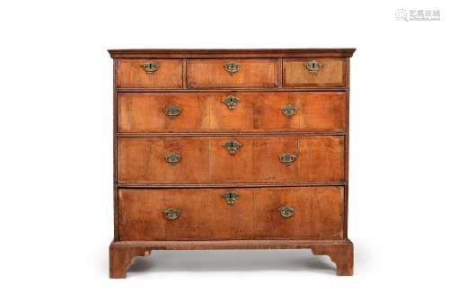 A George I walnut and crossbanded chest of drawers