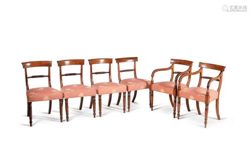 A set of ten late George III mahogany dining chairs
