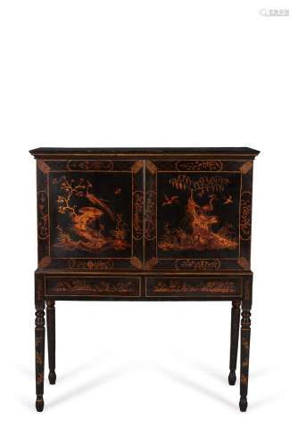 A Chinese Export black lacquer and gilt chinoiserie decorated cabinet on stand