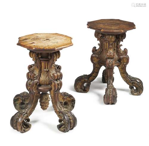 A pair of Continental walnut and parcel gilt quadrupartite low pedestals