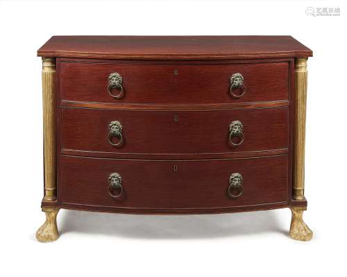 A George III patridgewood and parcel gilt bowfront commode