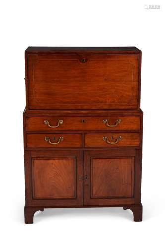 A George III mahogany and line inlaid secretaire cabinet