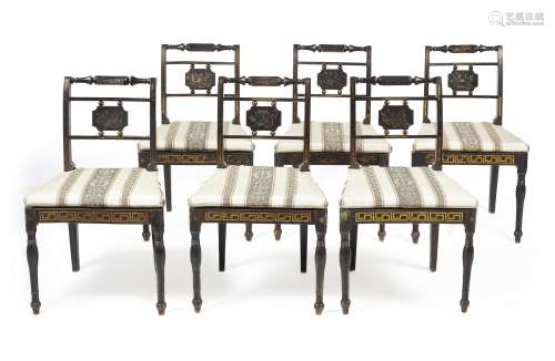 A set of six Regency black lacquer and polychrome painted chairs