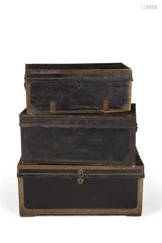 Three Chinese Export leather, studded and brass bound trunks