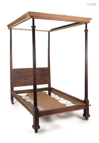 A George III mahogany four post bed