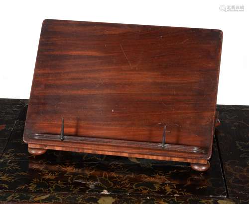 A George IV mahogany table top book rest, circa 1825, in the manner of Gillows