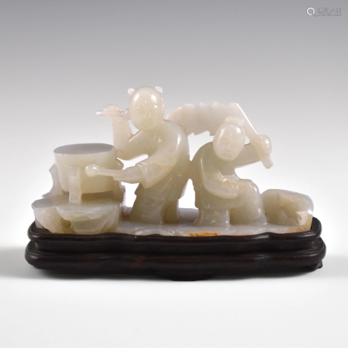CARVED JADE OF TWO CHILDREN WITH DRUM AND FLAG