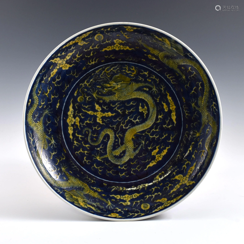 Kangxi reversed blue famille jaune dragon plate