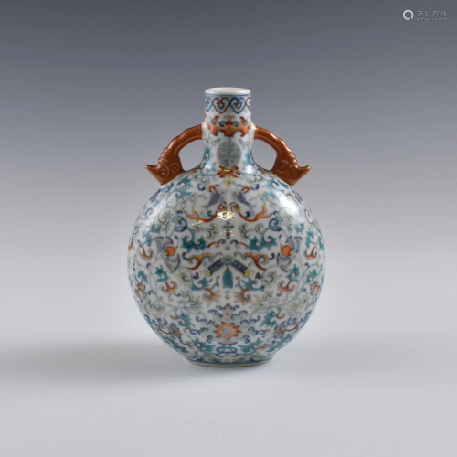 Qing doucai BaJiXiang motif porcelain moon vase