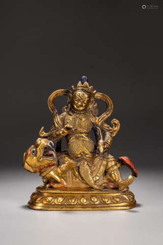 A CHINESE GILT BRONZE FIGURE OF VAISHRAVANA