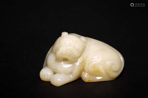 A CHINESE WHITE JADE CARVED MYTHICAL BEAST