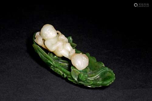 A WHITE JADE CARVED BOY AND GREEN JADE WASHER