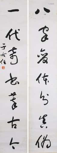 A PAIR OF INK ON PAPER CALLIGRAPHY COUPLET