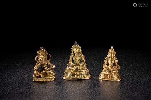 A GROUP OF THREE MINIATURE GILT BRONZE BODHISATTVAS