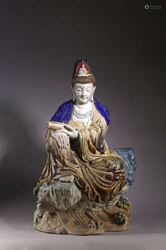 A LARGE CHINESE POLYCHROME GLAZED SEATED FIGURE OF GUANYIN