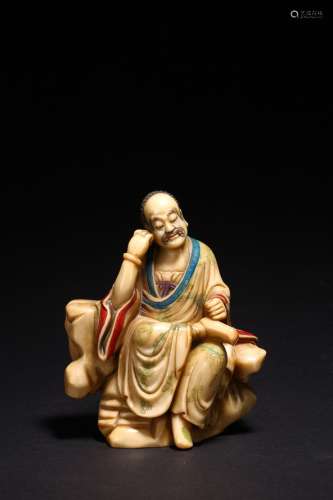 A CHINESE SHOUSHAN STONE LUOHAN FIGURE