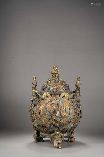 A CHINESE SILVER GILT 'FIGURES' INCENSE BURNER