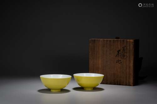 A PAIR OF LEMON-YELLOW GLAZED BOWLS