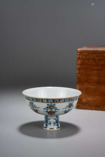 A DOUCAI 'BUDDHIST SYMBOLS' STEM CUP