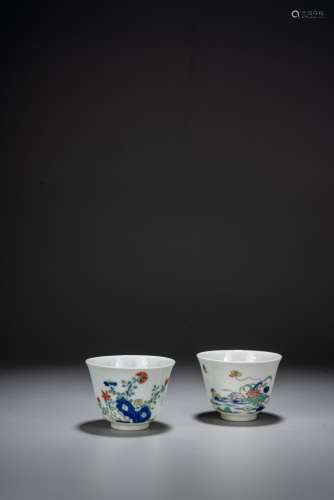 A PAIR OF WUCAI 'FLOWERS AND POEM' CUPS