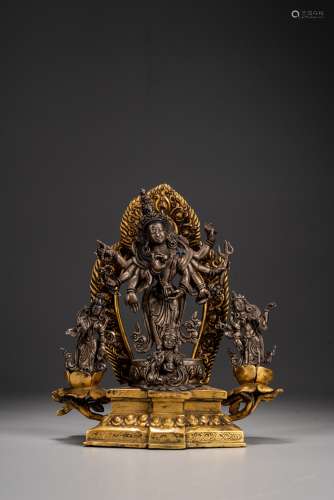 A SILVER GILT BRONZE FIGURAL GROUP OF BUDDHIST DEITIES