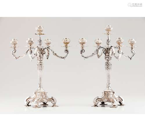 A pair of five branch candelabra