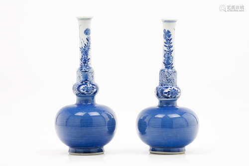 A pair of long neck scent vases