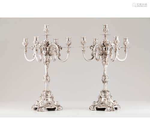 A pair of five branch candelabra