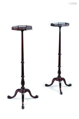 A pair of George III torcheres