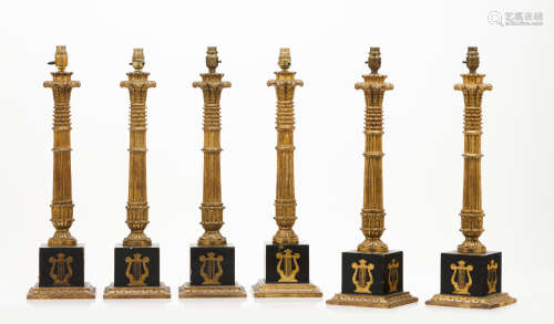 A set of six Empire style lamps