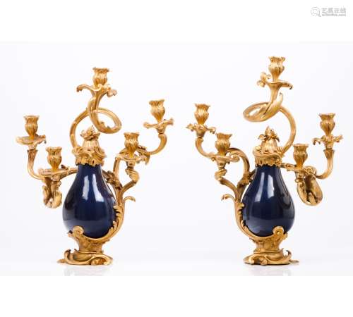 A pair of Louis XV five branch candelabra