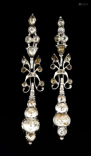 A pair of earrings said 